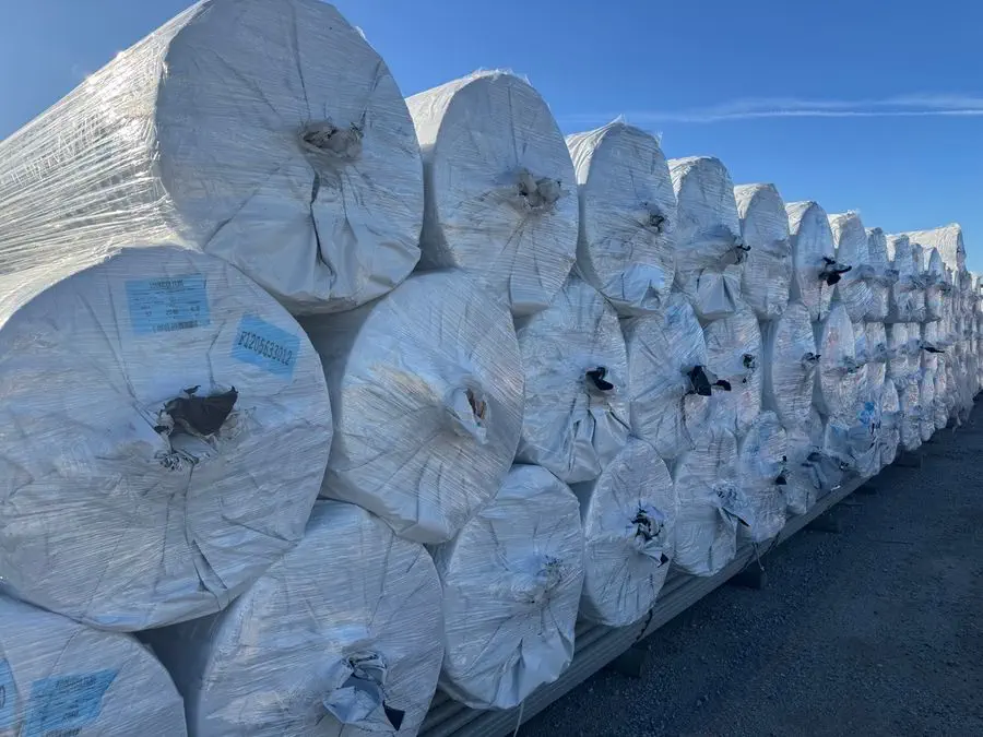 Close view of stacked full master rolls